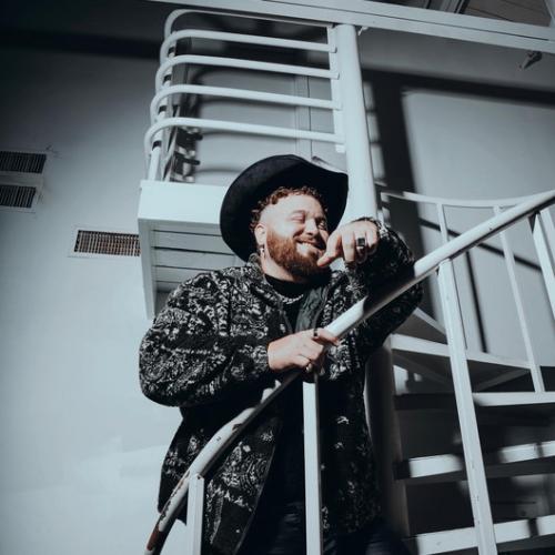 Артист Justin Champagne