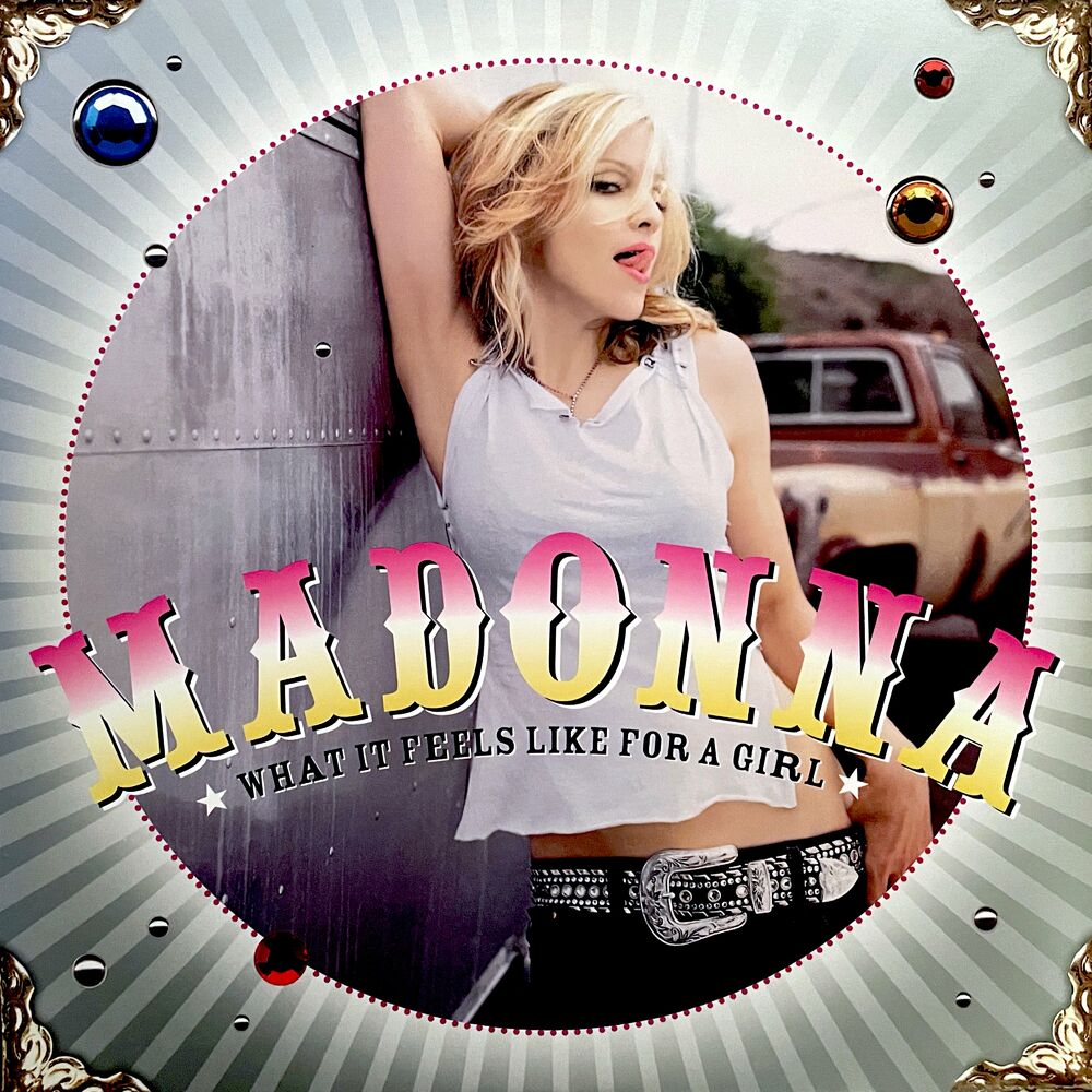 Lo Que Siente La Mujer (What It Feels Like For A Girl Spanish Version) - Madonna